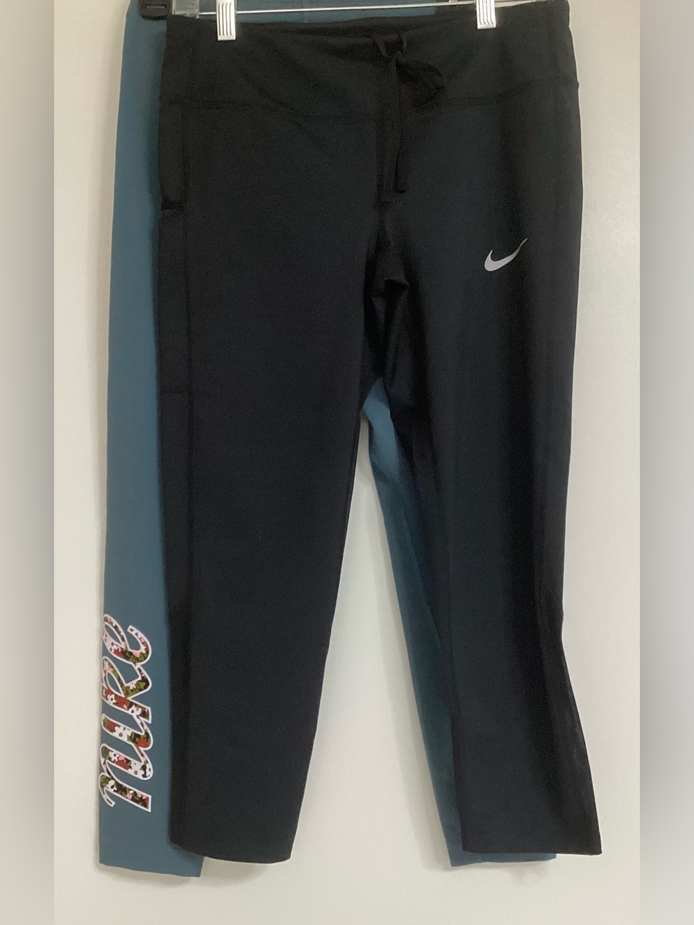 Nike Black dry fit and green Nike Athletic Leggings with Reflective Swoosh.